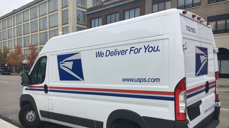 Delivery companies like UPS, FedEx and the United States Postal Service are hiring extra seasonal help this year to deal with the expectation of handling a record number of packages. STAFF PHOTO / HOLLY SHIVELY