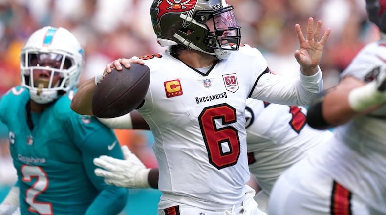Tampa Bay Buccaneers quarterback Baker Mayfield (6) throws a pass against the Miami Dolphins during the first half of an NFL football game Sunday, Dec. 28, 2025, in Miami Gardens, Fla. (AP Photo/Rebecca Blackwell)