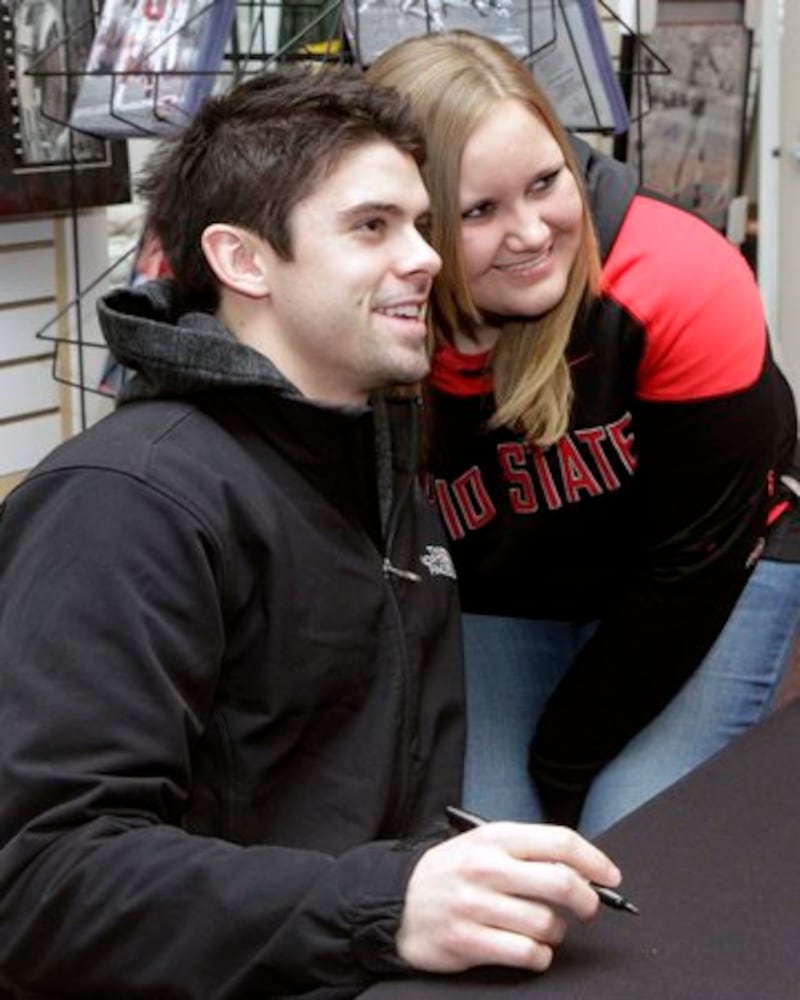 OSU's Dane Sanzenbacher signs autographs