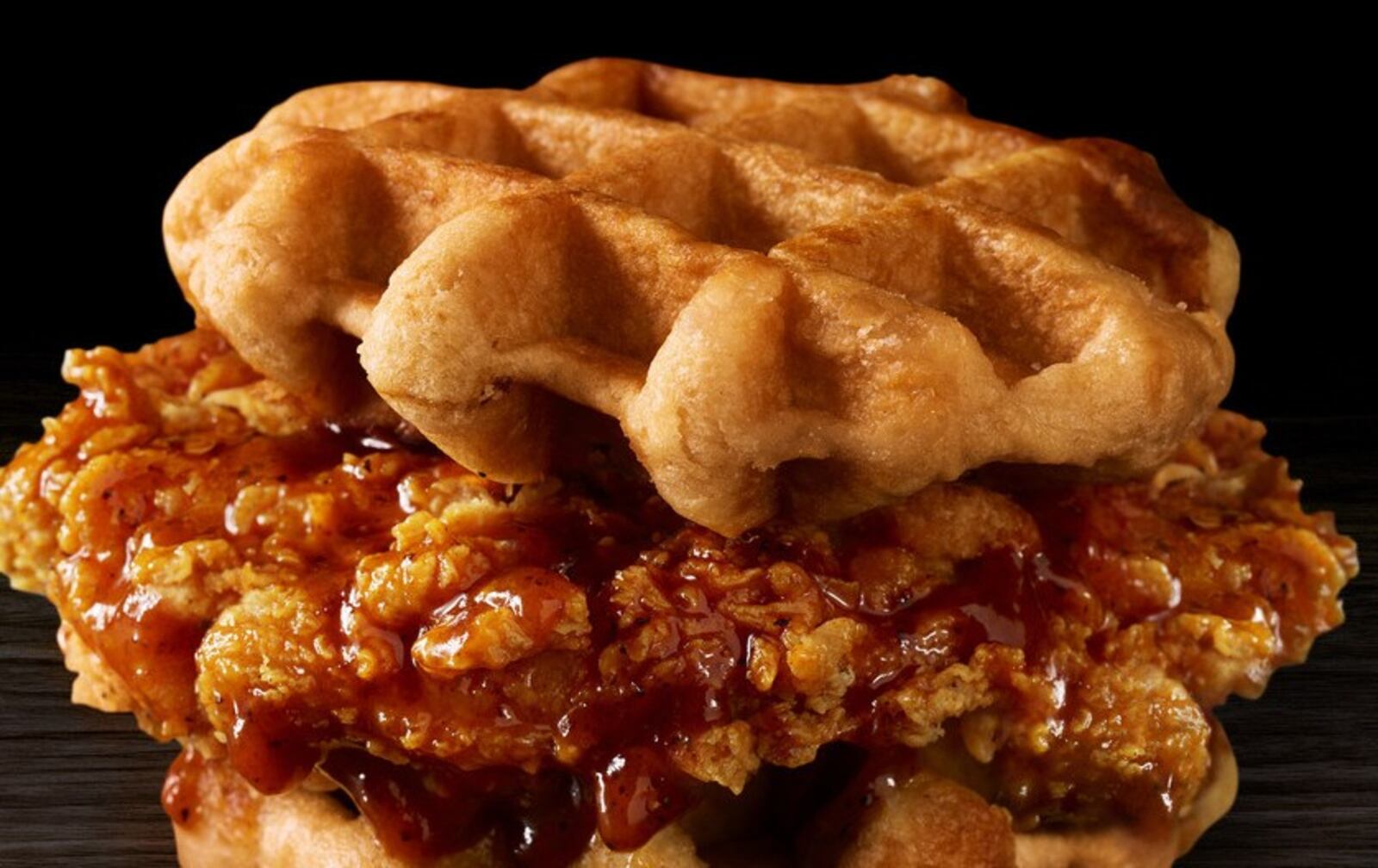 Kentucky Fried Chicken & Waffles is available as a sandwich featuring KFC's recently-introduced sweet-heat Hot Honey fried chicken as a breast fillet in between two waffles. Contributed photo