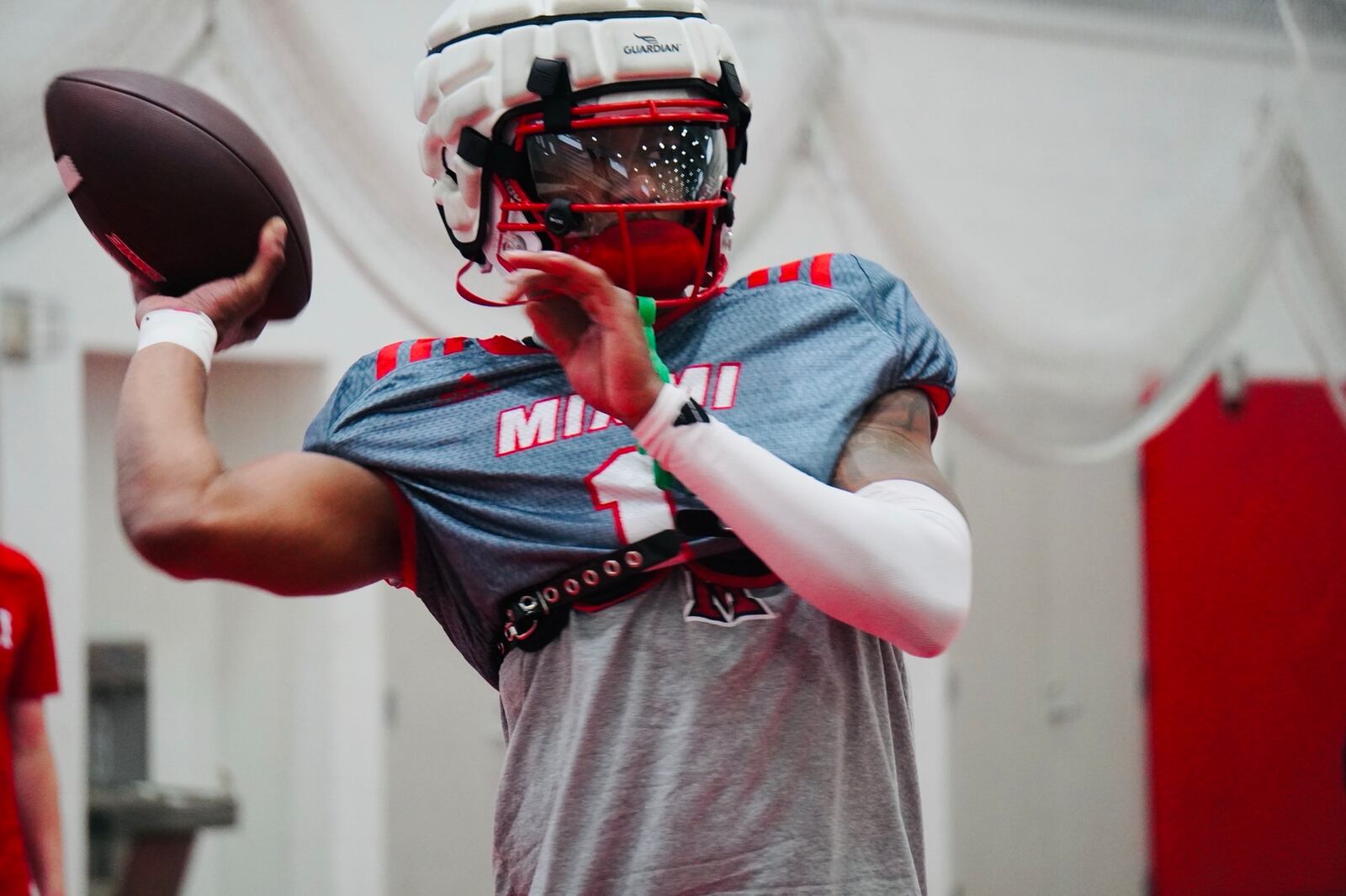 Miami University quarterback Dequan Finn warms up before the RedHawks' annual Spring Showcase on Saturday inside the Dauch Indoor Sports Center. CHRIS VOGT/CONTRIBUTED PHOTO