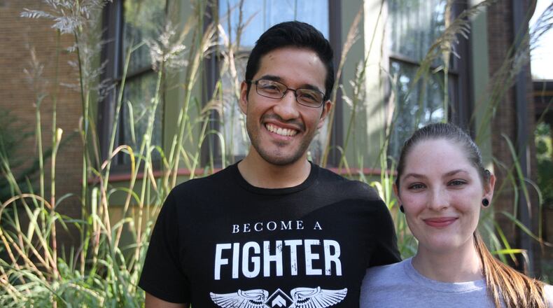 Tony Bucio of Dayton, shown here with his girlfriend, Ali Laux, was exposed to porn at age 8. Laux convinced him to seek counseling because his addiction was causing problems in their relationship. BYRON STIRSMAN/PHOTO