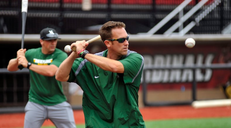 Wright State baseball coach Greg Lovelady hits infield during practice Thursday at the University of Louisville’s Jim Patterson Stadium, where the Raiders will face Ohio State in the NCAA Regionals today at 2 p.m. Staff photo
