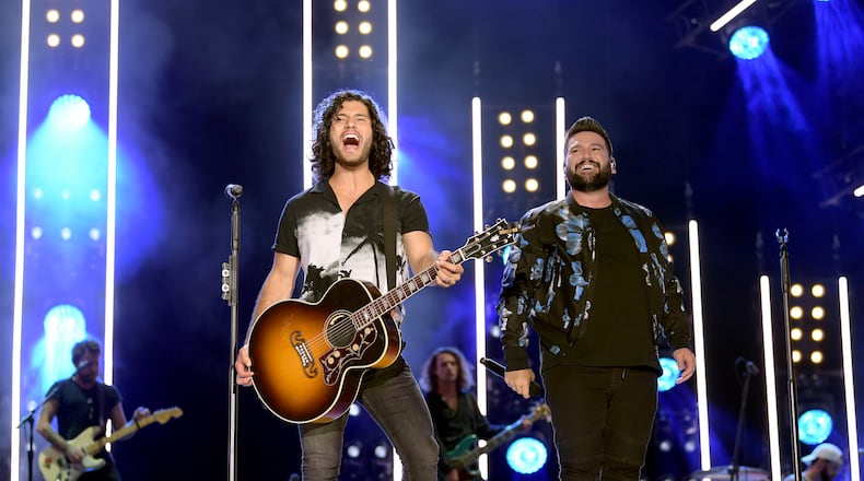 NASHVILLE, TENNESSEE - JUNE 07: (EDITORIAL USE ONLY) Dan Smyers and Shay Mooney of Dan + Shay perform on stage during day 2 for the 2019 CMA Music Festival on June 07, 2019 in Nashville, Tennessee. (Photo by Jason Kempin/Getty Images)