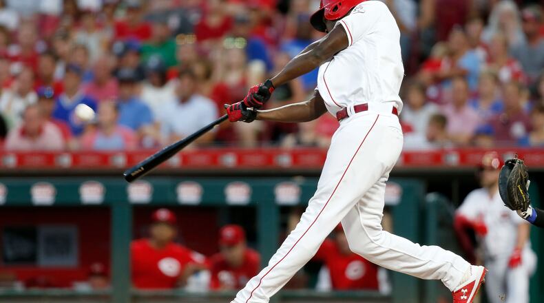 CINCINNATI, OH - AUGUST 10:  Aristides Aquino #44 of the Cincinnati Reds hits a solo home run for his third home run of the game during the third inning against the Chicago Cubs at Great American Ball Park on August 10, 2019 in Cincinnati, Ohio. (Photo by Kirk Irwin/Getty Images)