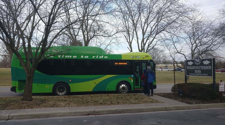Base personnel board an RTA bus on route X1A near the lodging office in Area A Jan. 31. As of Feb. 18, the RTA will begin providing transportation to and from the base through its RTA Connect On-Demand service, which means riders will still use the regular RTA buses to get to one of the RTA Connect transfer point locations, either at Wright State University on the Route 1 or at Old Harshman Road at Springfield Street on the Route 11. From there, a taxi provider or one of RTA’s other providers (an RTA driver with a smaller vehicle) will pick riders up at that location and then take them on base to the building they want to go to. (U.S. Air Force photo/2nd Lt. Weston Woodward)