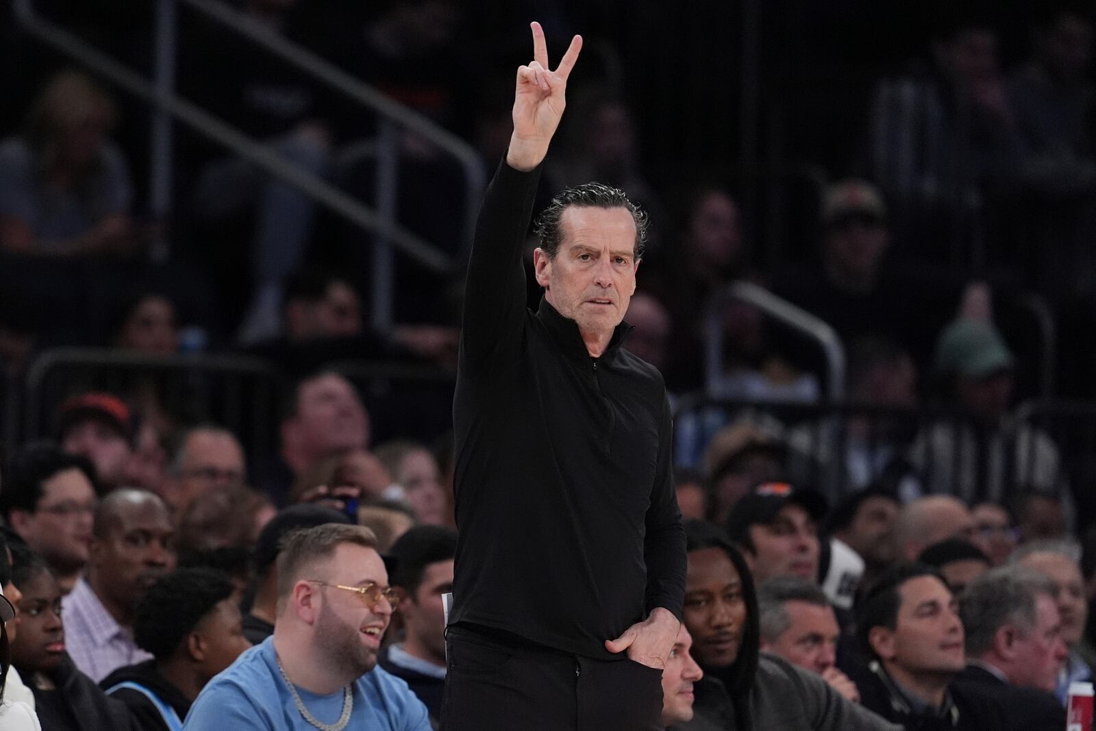 Cleveland Cavaliers head coach Kenny Atkinson signals during the first half of an NBA basketball game against the New York Knicks Friday, April 11, 2025, in New York. (AP Photo/Seth Wenig)