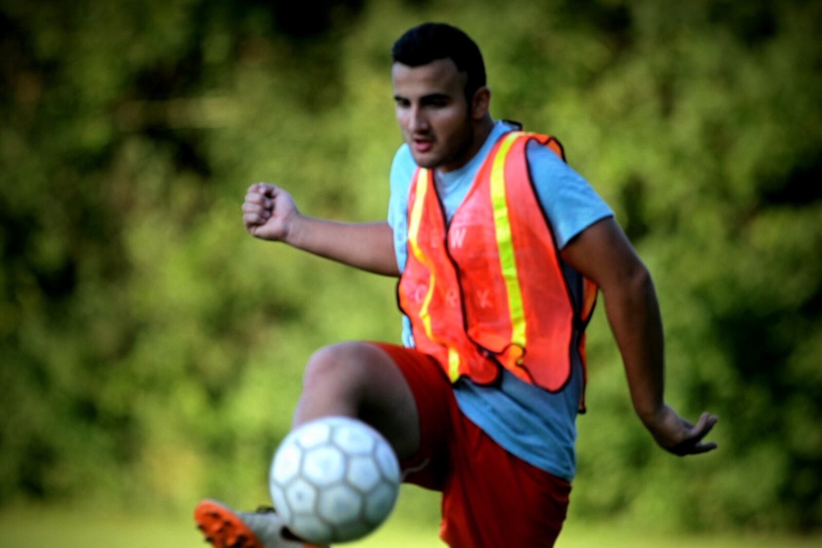 Mukhammad Shadhnanov is hoping a donation from Dayton Children's Hospital helps him get a youth soccer team off the ground. (Jim Noelker/Staff)