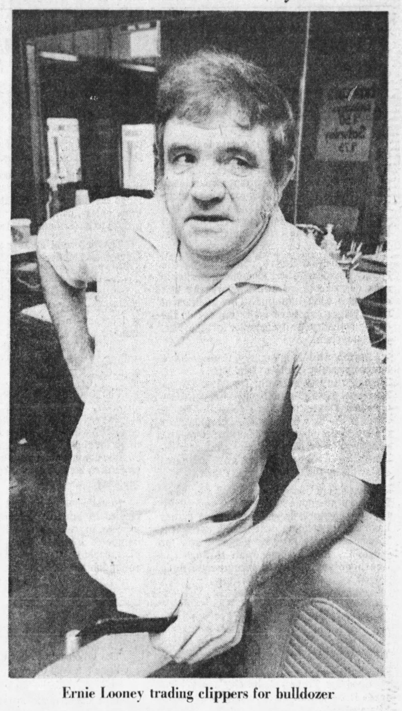 When Ernie Looney took over the barber shop in Miamisburg in May, 1975, the owner charged only $1.25. DAYTON DAILY NEWS ARCHIVES