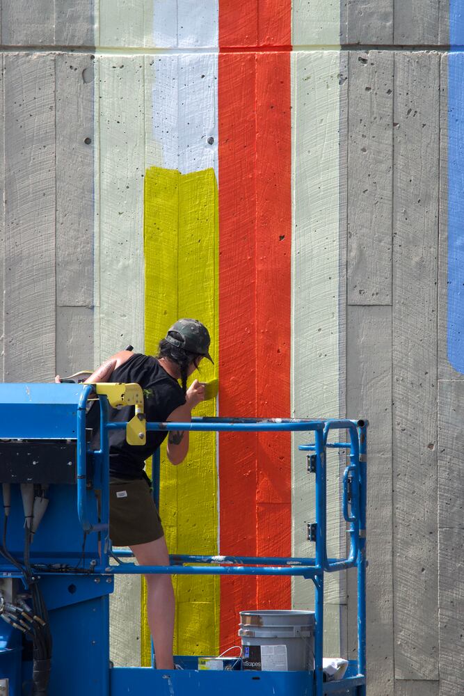 PHOTOS: New vibrant mural design energizes Dayton Transportation Center Garage