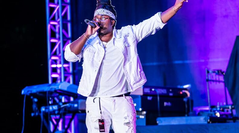 Issa Ali, local hip-hop artist, performs during one of Dave Chappelle’s events in Yellow Springs. CONTRIBUTED