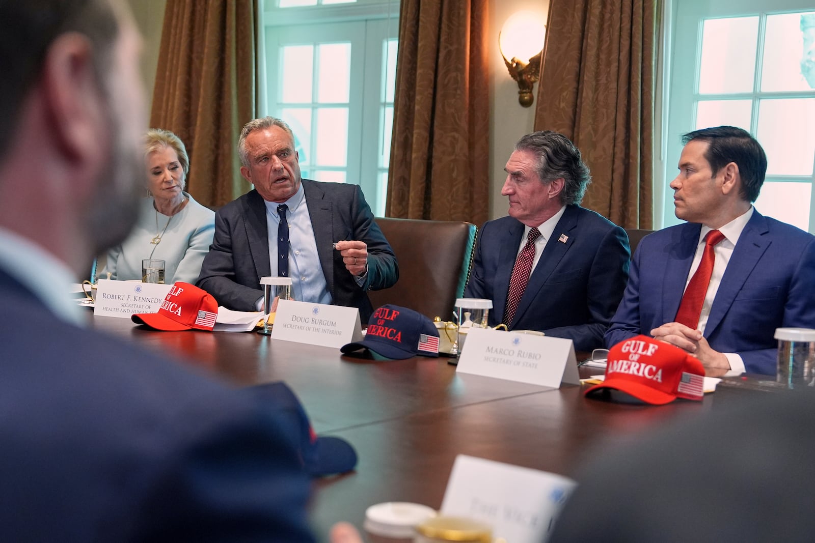Secretary of Health and Human Services Robert F. Kennedy, Jr., speaks during a cabinet meeting at the White House, Wednesday, April 30, 2025, in Washington, as from left, Vice President JD Vance, Secretary of Education Linda McMahon, Kennedy, Secretary of Interior Doug Burgum and Secretary of State Marco Rubio, look on. (AP Photo/Evan Vucci)