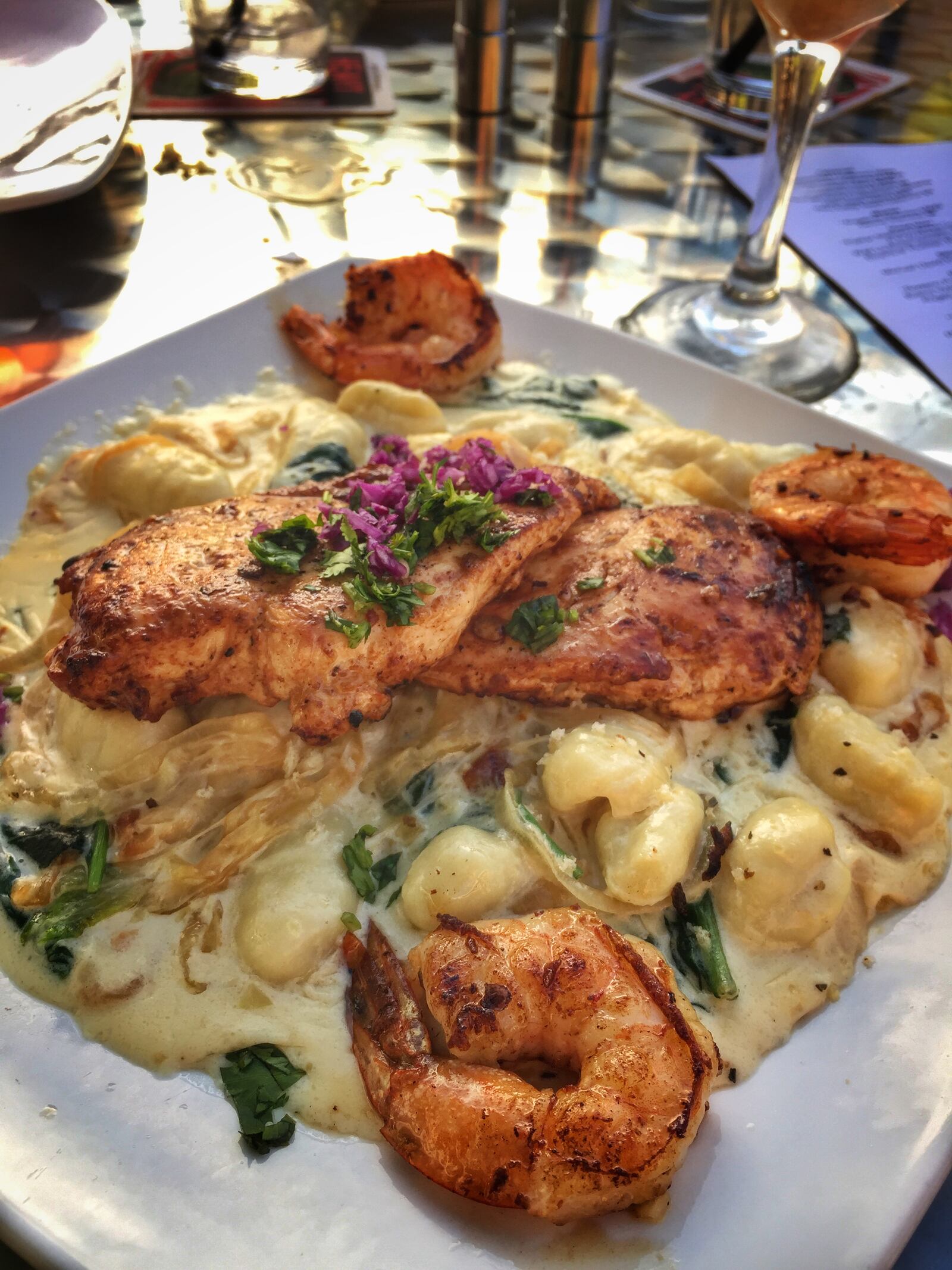 The Shrimp and Chicken Rockefeller comes with gnocci and a delicious caramelized onion sauce at Basil's on Market.