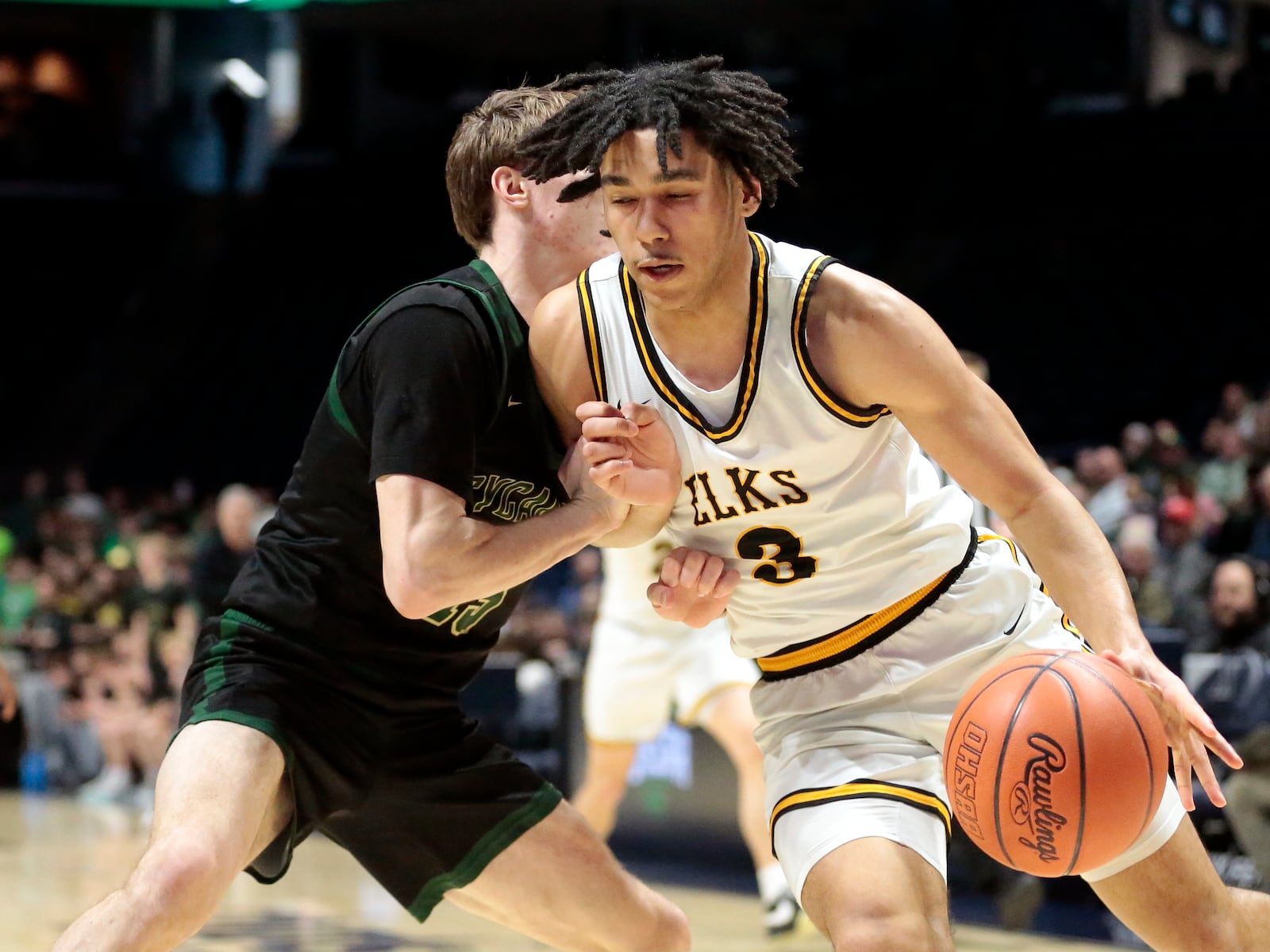 Centerville junior Trey Sam tries to drive along the baseline during a Division I district title game on Sunday, March 8, 2026, at the Cintas Center in Cincinnati. STEVEN WRIGHT / STAFF