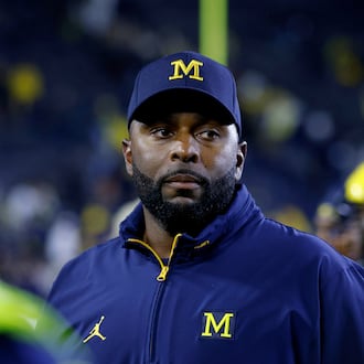 FILE - Michigan coach Sherrone Moore walks off the field following an NCAA football game Aug. 30, 2025, in Ann Arbor, Mich. (AP Photo/Al Goldis, File)