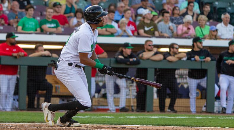 Dayton's Justice Thompson singles  against West Michigan earlier this week at Day Air Ballpark. Jeff Gilbert/CONTRIBUTED