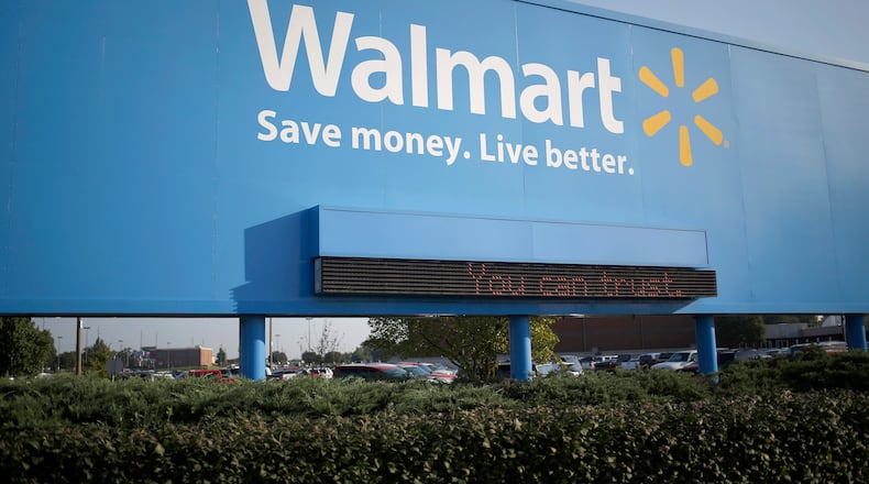 A sign outside of the Wal-Mart Stores Inc. headquarters building in Bentonville, Ark. Luke Sharrett, Bloomberg