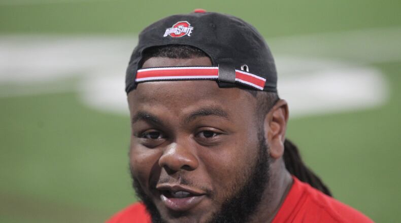 Dayton Daily News columnist Tom Archdeacon interviews Ohio State’s Tracy Sprinkle on Monday, Aug. 28, 2017, at the Woody Hayes Athletic Center in Columbus. DAVID JABLONSKI / STAFF