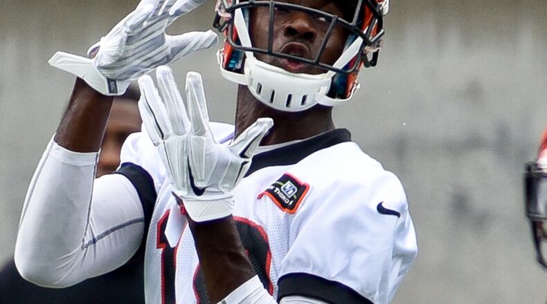 Wide receiver A.J. Green makes a catch during Bengals minicamp Wednesday, June 17 at Paul Brown Stadium in Cincinnati. NICK GRAHAM/STAFF