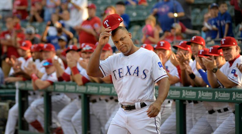 Texas Rangers third baseman Adrian Beltre tips his hat to the fans during the celebration of his reaching the 3,000-hit plateau earlier this season, before a game against the New York Yankees at Globe Life Park in Arlington, Texas, on Friday, Sept. 8, 2017. (Max Faulkner/Fort Worth Star-Telegram/TNS)
