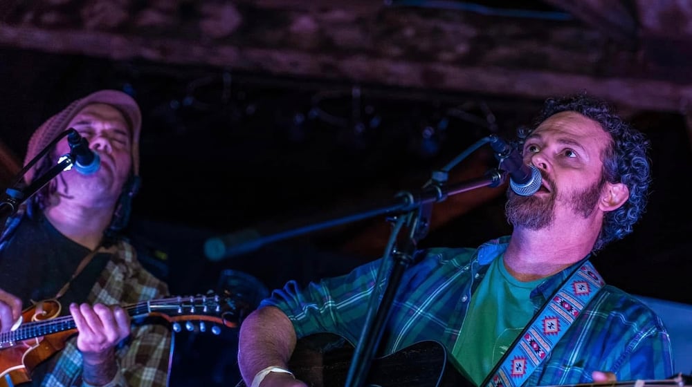 Mando McPickin (left) and Moroni Lane, of Dayton acoustic duo Emerald Alliance, are hosting the third Music is Medicine showcase and gathering in Franklin. It will also feature McPickin solo and Sam Frampton. Emerald Alliance plans on hosting the event monthly in 2026. JORDAN LYNN FRESHOUR/CONTRIBUTED