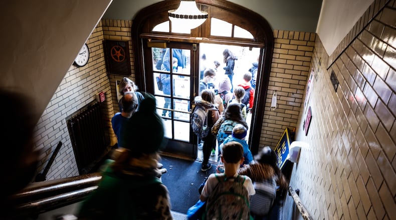 Students at Smith Elementary School in Oakwood exit the building. Jim Noelker/Staff