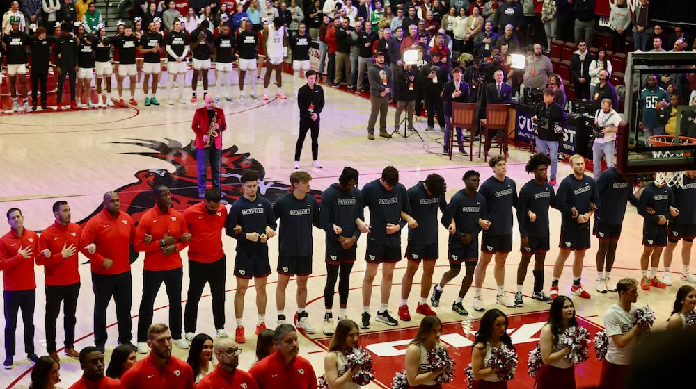 Dayton stands for the national anthem before a game against Saint Joseph’s on Tuesday, Feb. 6, 2024, at Hagan Arena in Philadelphia. David Jablonski/Staff