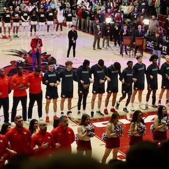 Dayton stands for the national anthem before a game against Saint Joseph’s on Tuesday, Feb. 6, 2024, at Hagan Arena in Philadelphia. David Jablonski/Staff