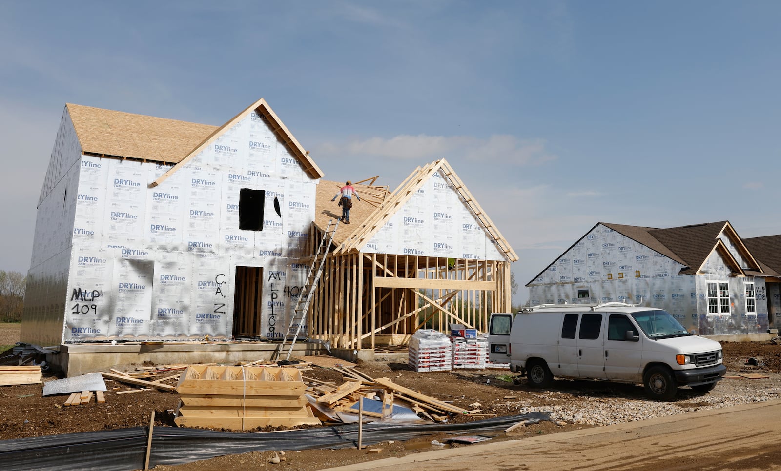 Construction is underway Tuesday, April 29, 2025, in the Fischer Homes neighborhood of Melody Parks, a development of 1,200 housing units and retail spaces near East National Road on Springfield's east side to be be completed over the next seven to 10 years. JOSEPH COOKE/STAFF
