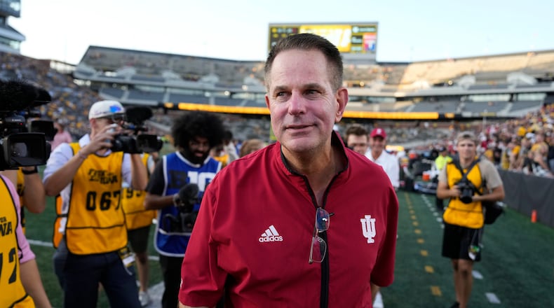 Indiana head coach Curt Cignetti walks off the field after an NCAA college football game against Iowa, Saturday, Sept. 27, 2025, in Iowa City, Iowa. (AP Photo/Charlie Neibergall)