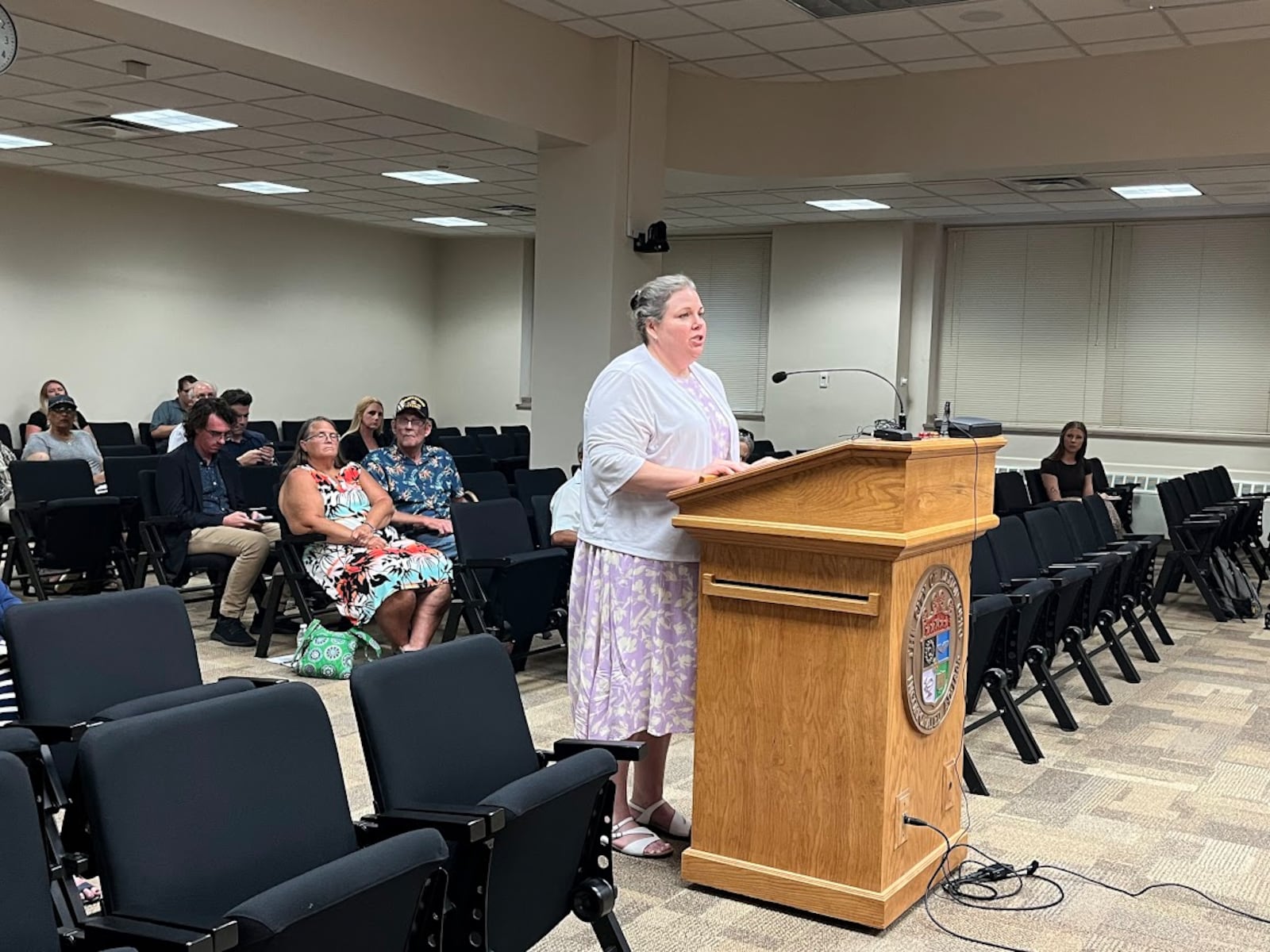 Erin Jeffries, president and chief executive of Miami Valley Community Action Partnership, spoke with representatives of the Public Utilities Commission of Ohio in a public hearing Tuesday July 29, 2025. She voiced opposition to proposed higher natural gas rates from CenterPoint Energy Ohio. THOMAS GNAU/STAFF