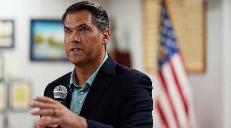 Democratic gubernatorial candidate Geoff Duncan speaks to a group, Jan. 21, 2026, in Marietta, Ga. (AP Photo/Mike Stewart)