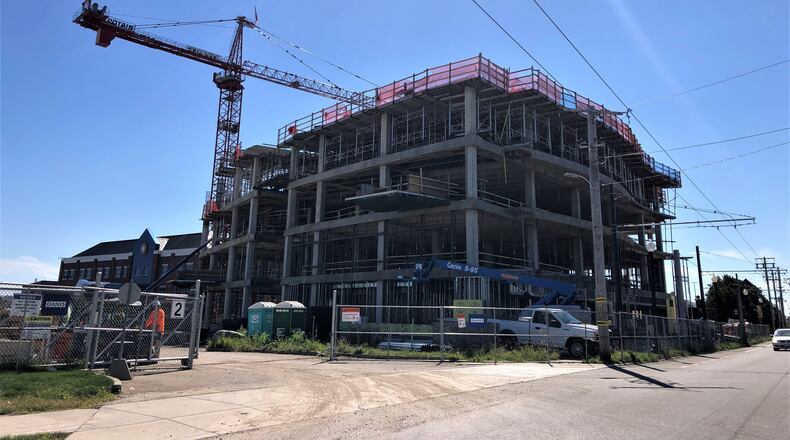 Construction is underway on a new specialty care outpatient center on Dayton Children's Hospital's main campus. The building is expected to open in 2023. CORNELIUS FROLIK / STAFF