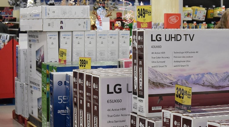 Several stores are offering deals on large televisions. STAFF PHOTO / HOLLY SHIVELY