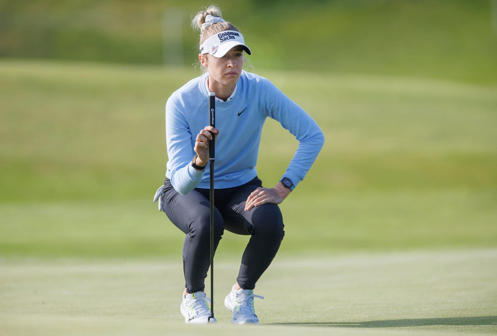 Nelly Korda, of the United States, lines up a putt during the first round of the women's Scottish Open golf tournament, Thursday, July 24, 2025, at Dundonald Links in Irvine, Scotland. (Steve Welsh/PA via AP)