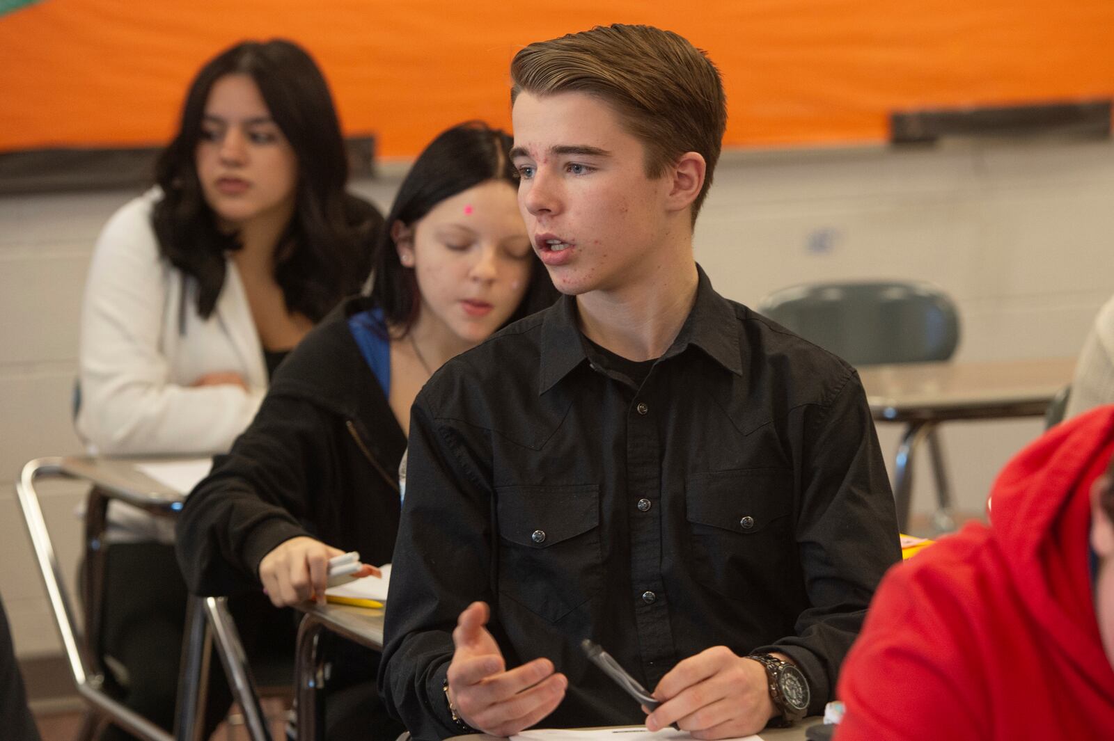 FILE - Mansfield Senior High School freshman Nathan Baker, 14, speaks during his health class on sleep, in Mansfield, Ohio, Dec. 6, 2024. (AP Photo/Phil Long, File)