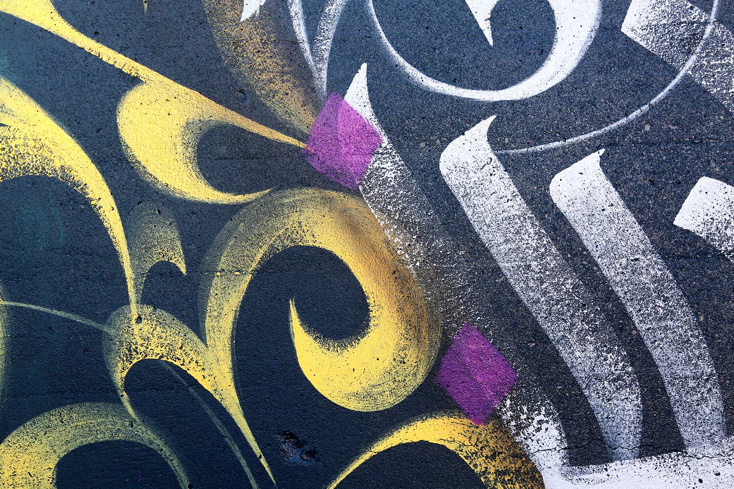 PHOTOS: New Dayton mural created in calligraffiti style with more than 20 colors