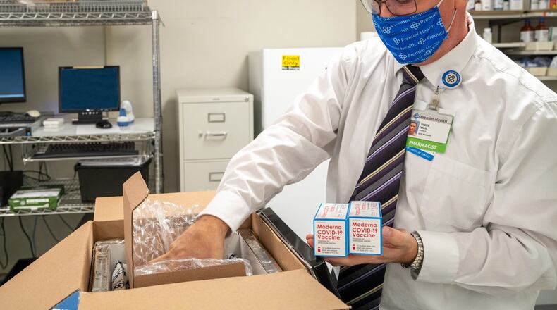Upper Valley Medical Center in Troy received 600 doses of the Moderna coronavirus vaccine Monday morning. Vince Yahl, the pharmacy site manager at Upper Valley, unpacks the doses. Photo courtesy of Premier Health