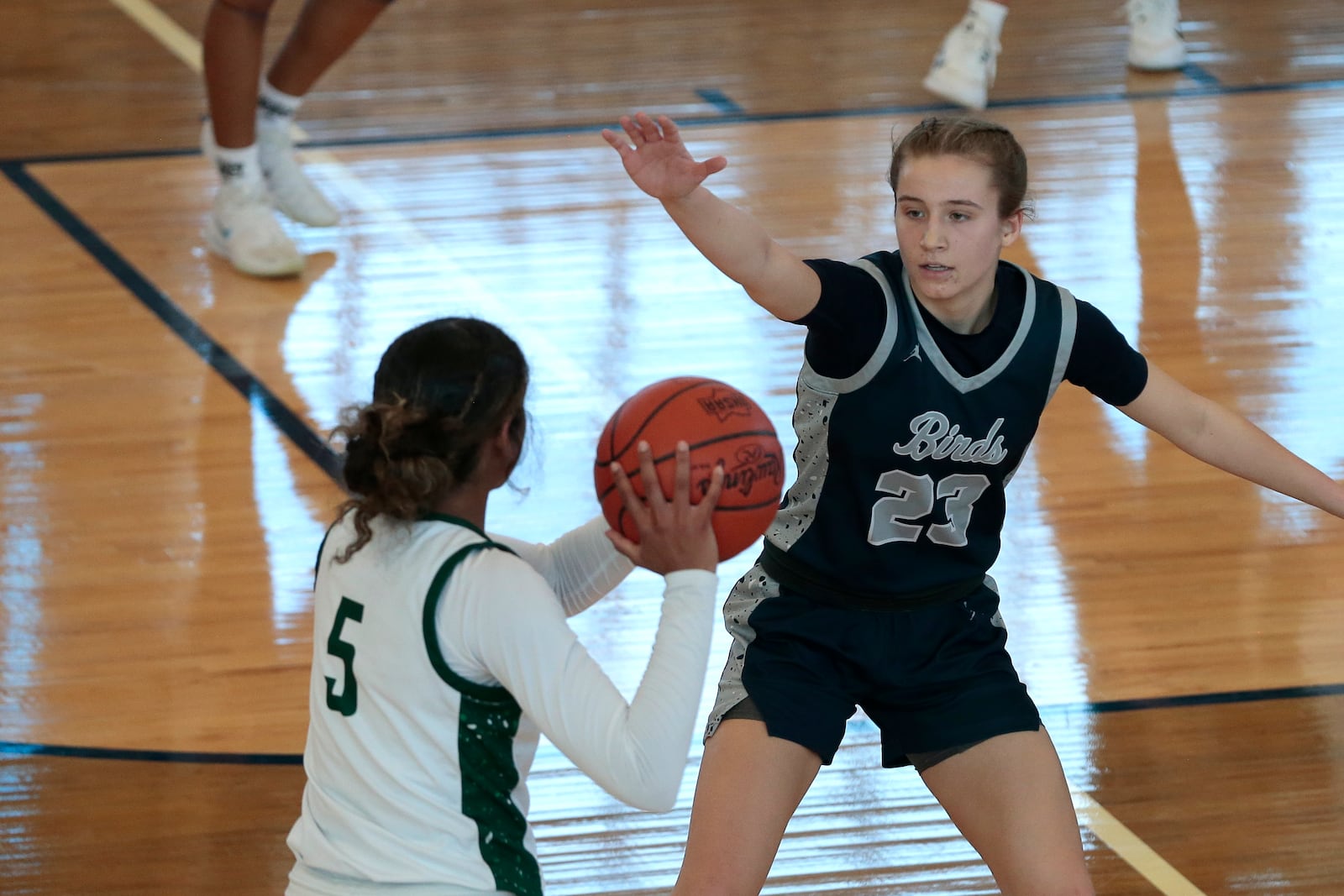 Fairmont junior Peyton Adams guards Mason freshman Clara Anderson. Fairmont defeated Mason 61-31 in a Division I district championship game on Saturday, Feb. 28, 2026, in Fairborn. STEVEN WRIGHT / STAFF
