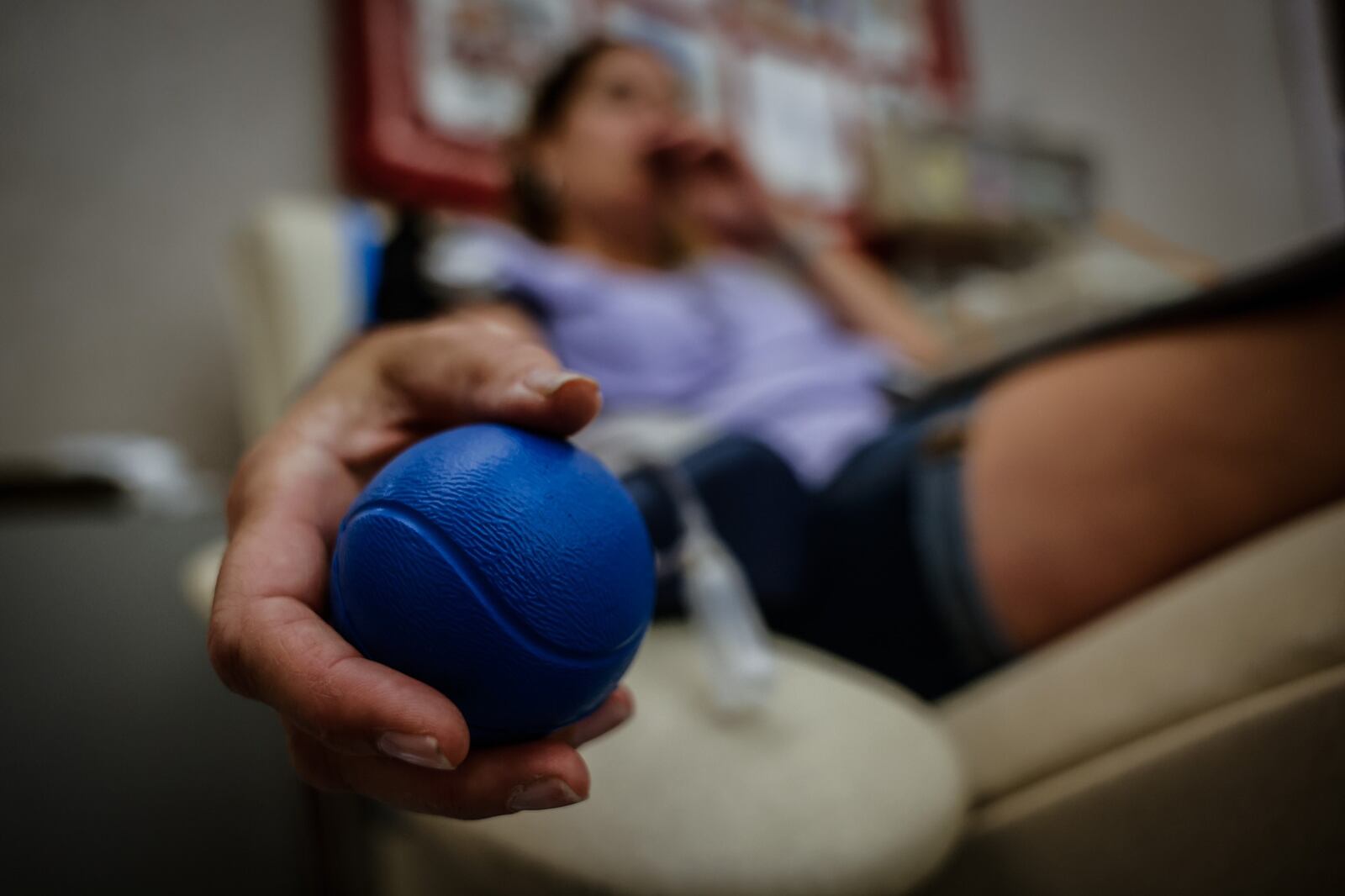Nancy Gillespie, from Dayton, donates blood at the Dayton Community Blood Center Monday June 28, 2021. JIM NOELKER/STAFF
