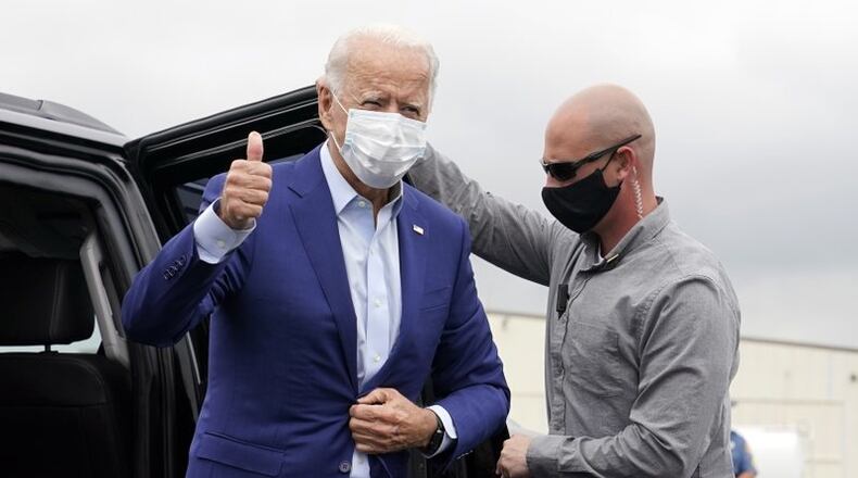 Democratic presidential candidate and former Vice President Joe Biden arrives to board a plane at New Castle Airport in New Castle, Delaware, on Wednesday, Sept. 9, 2020, en route to campaign events in Michigan.