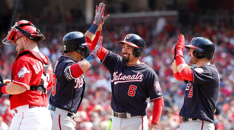 CINCINNATI, OH - JUNE 01: Gerardo Parra #88 of the Washington Nationals is congratulated by Anthony Rendon #6 and Brian Dozier #9 after hitting a three-run home run in the second inning against the Cincinnati Reds at Great American Ball Park on June 1, 2019 in Cincinnati, Ohio. (Photo by Joe Robbins/Getty Images)