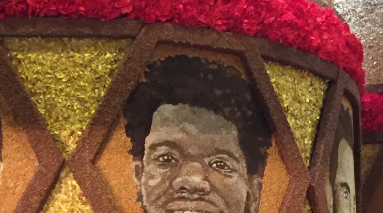 Late Dayton center Steve McElvene's picture is made out of flowers on a Donate Life float that will be in the Rose Bowl Parade on Jan. 1, 2019, in Pasadena, Calif. Photo by Jenell Shoals