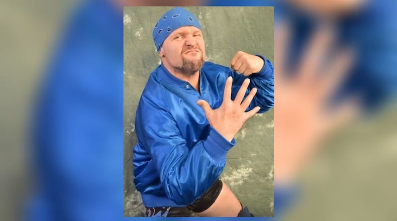 This is a wrestler promo photograph for a Future Great Wrestlers athlete. PROVIDED