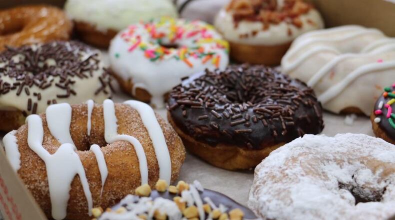 Duck Donuts is giving away free cinnamon sugar donuts on National Donut Day. No purchase is necessary. MARK FISHER/STAFF