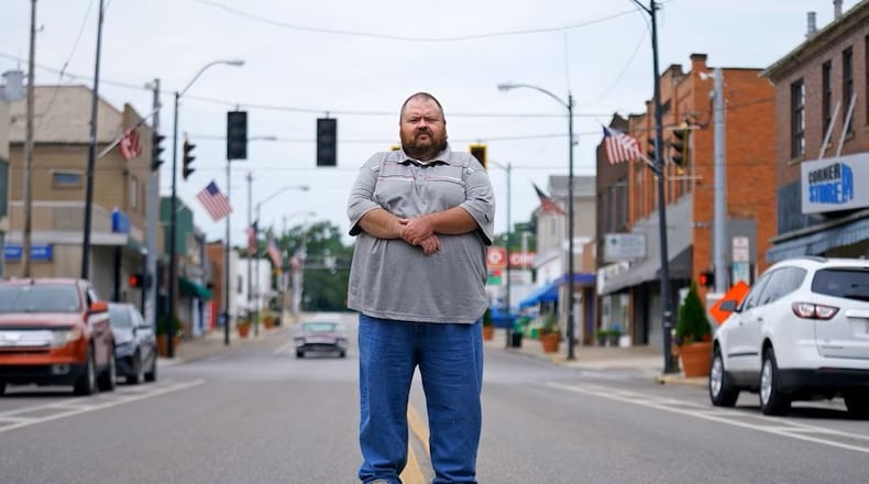 East Palestine, Ohio Mayor Trent Conaway poses for a photo on Market Street, Saturday, July 15, 2023, in East Palestine. (Matt Freed for the Atlanta Journal Constitution)