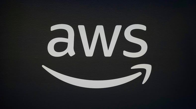 FILE - An AWS, Amazon Web Services, logo is displayed at LlamaCon 2025, an AI developer conference, in Menlo Park, Calif., Tuesday, April 29, 2025. (AP Photo/Jeff Chiu, File)