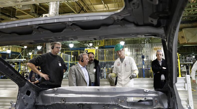 Honda’s Scott King explaines to a group of journalists how the new stronger, lighter frame is made for the new 2017 Honda CRV at their East Liberty plant. Bill Lackey/Staff