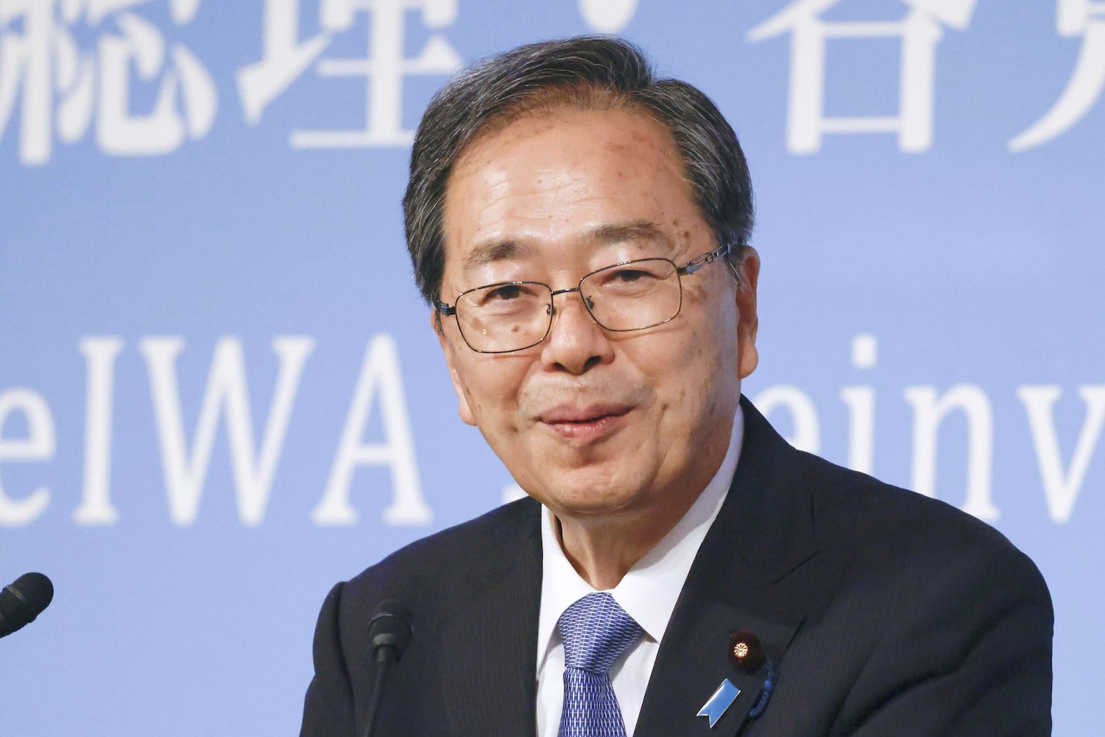 Tetsuo Saito, chief representative of the Komeito speaks during a convention held by Reiwa Rincho group in Tokyo, on June 29, 2025.(Kyodo News via AP)