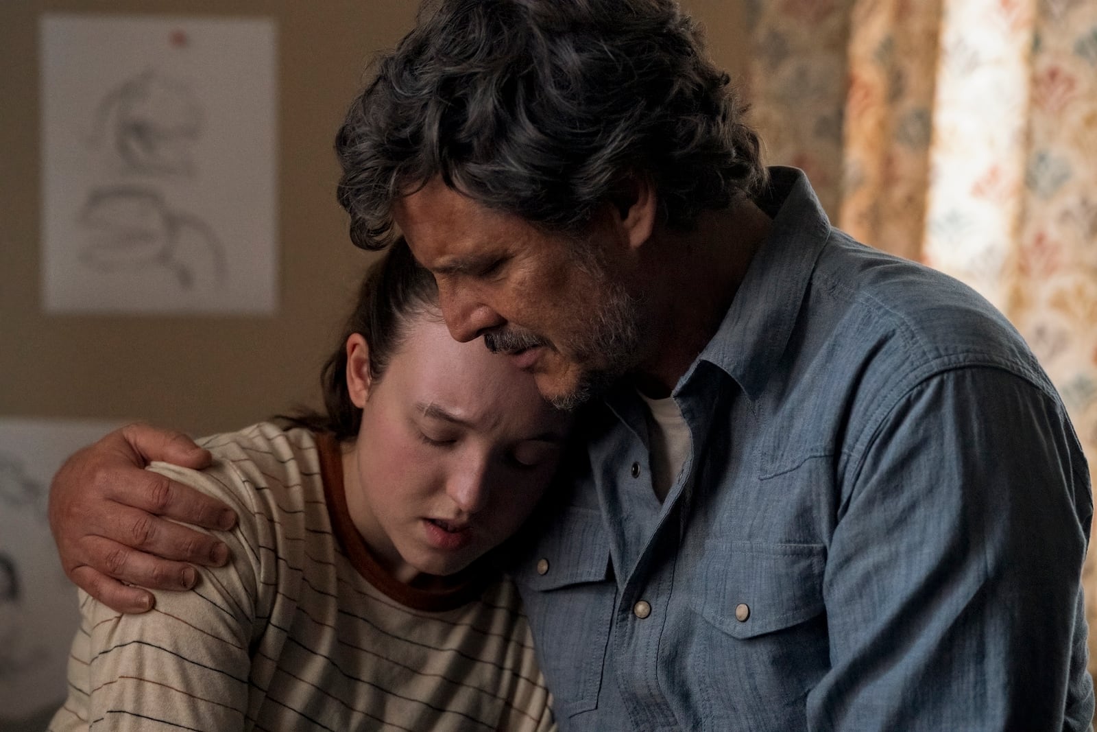 This image released by HBO shows Bella Ramsey, left, and Pedro Pascal in a scene from "The Last of Us." (HBO via AP)